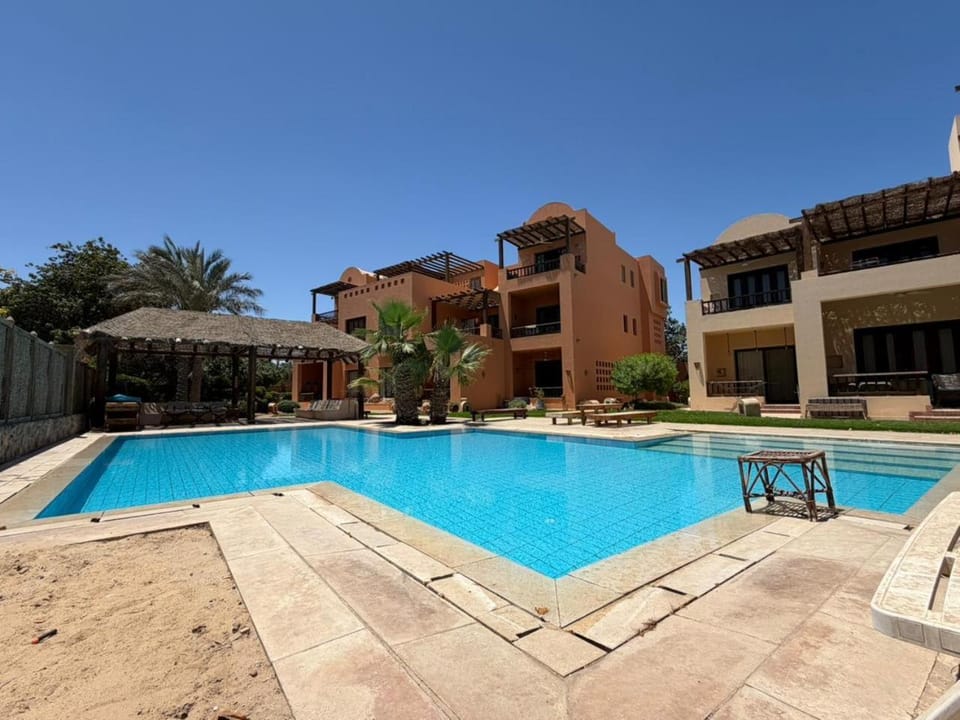 Property building, Pool view, Swimming pool, sunbed