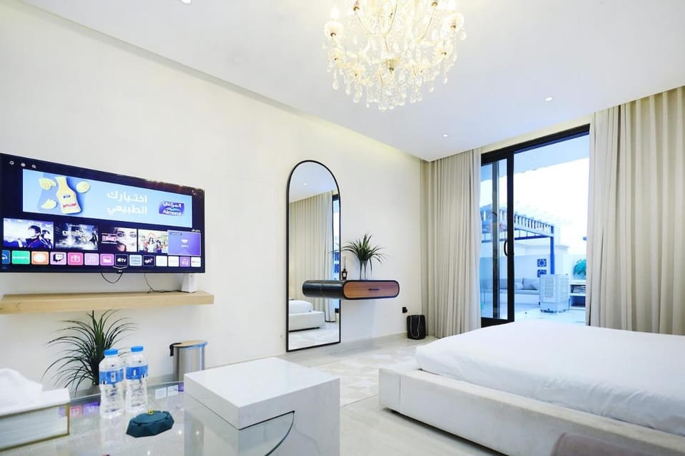 1BR 65 TV Greek-Style Rooftop Self-Entry 28 Apartment in Riyadh