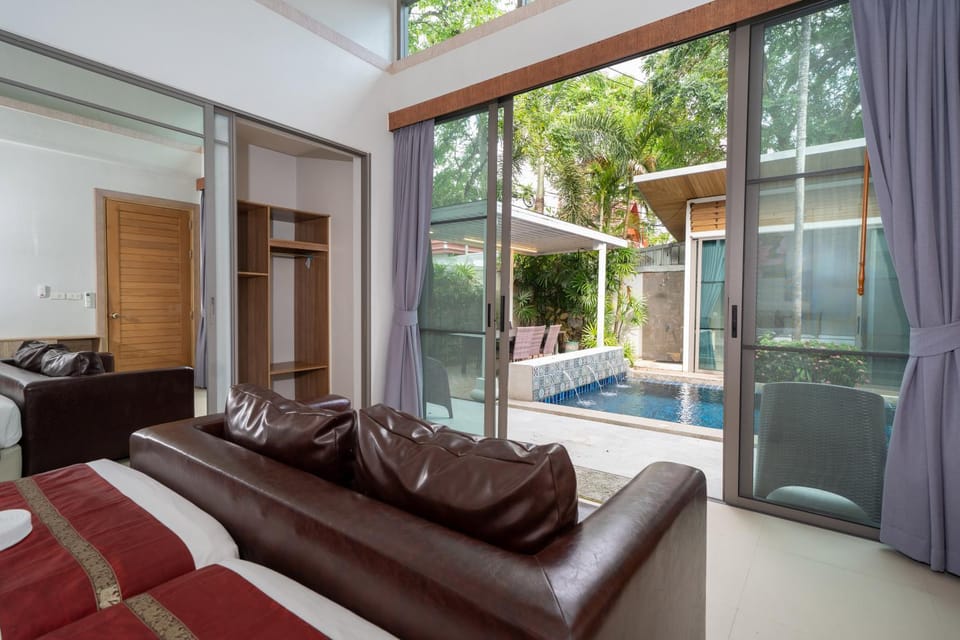 Bed, Seating area, Bedroom, Pool view