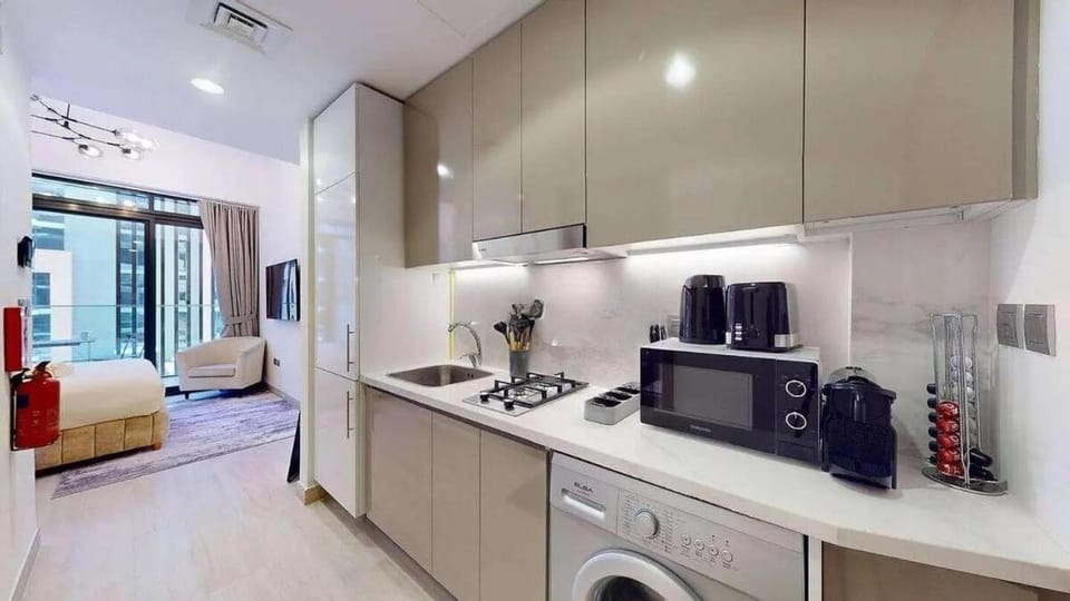 Coffee/tea facilities, Kitchen or kitchenette, oven, stove, washing machine