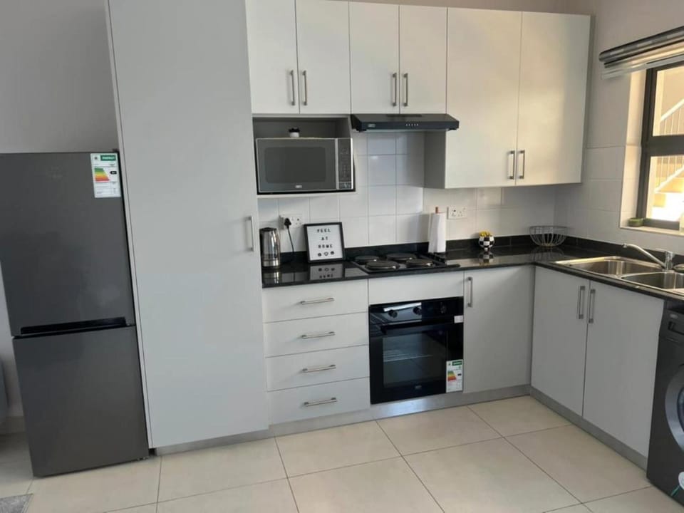 Kitchen or kitchenette, oven