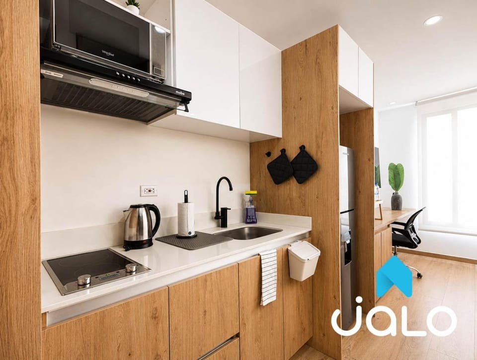 Kitchen or kitchenette, microwave, stove