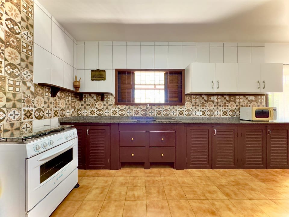 Kitchen or kitchenette, oven, stove