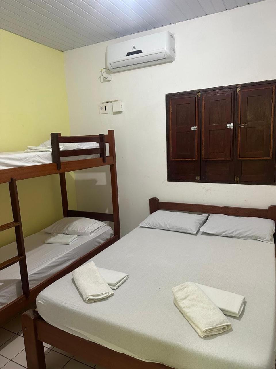 Bed, Photo of the whole room, Bedroom, bunk bed, towels, air conditioner