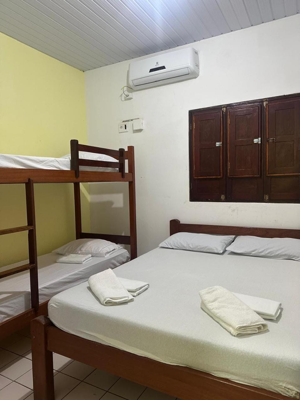 Bed, Photo of the whole room, Bedroom, bunk bed, towels, air conditioner
