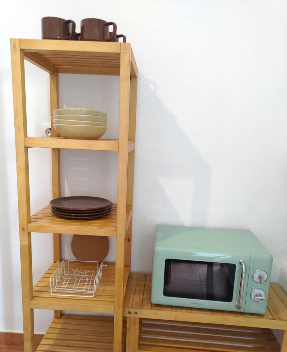 Kitchen or kitchenette, microwave