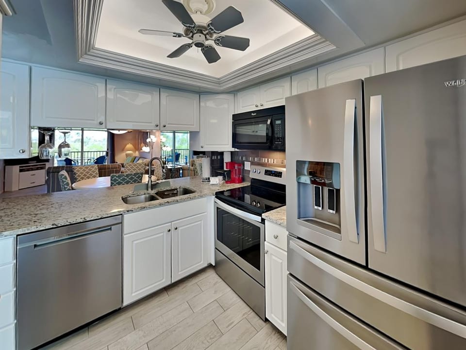 Kitchen or kitchenette, Living room, dishwasher, furniture, microwave, oven, stove, kitchen