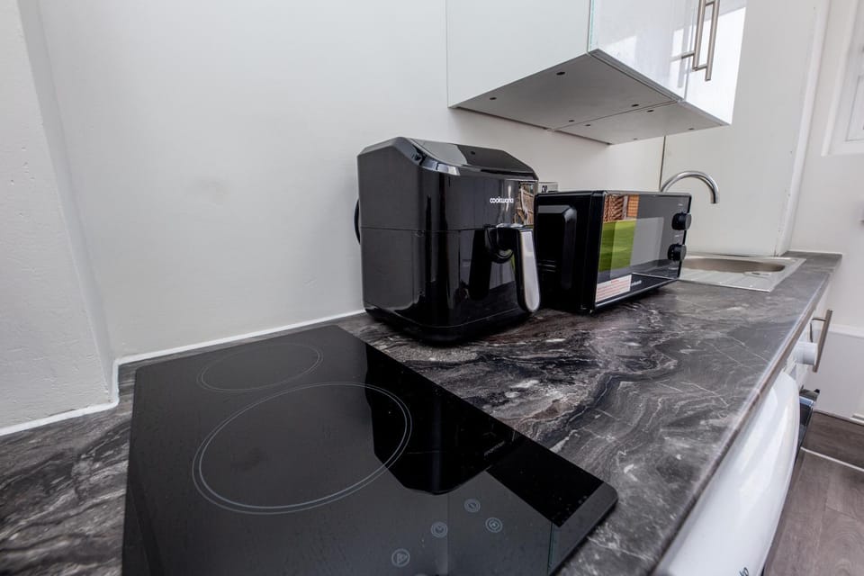 Kitchen or kitchenette, stove