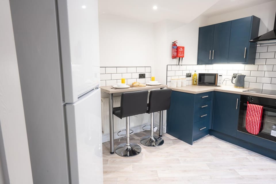 Kitchen or kitchenette, Dining area, dishwasher, stove, toaster