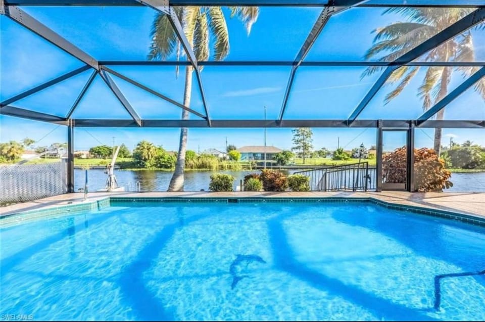 Paradise in Cape w Heated Pool and Gulf Access House in Cape Coral