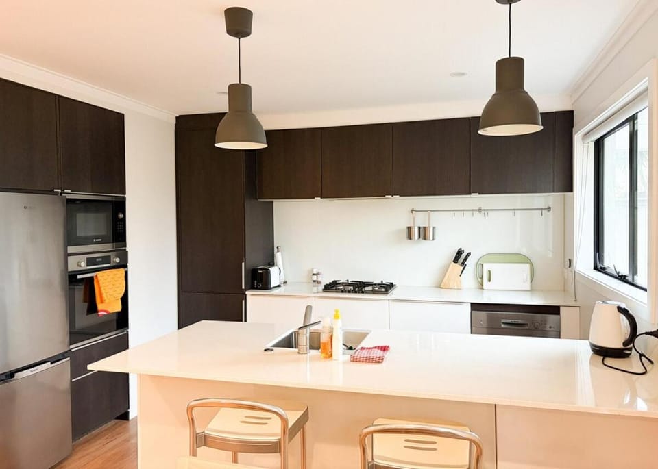 Kitchen or kitchenette, dishwasher, oven, stove, toaster