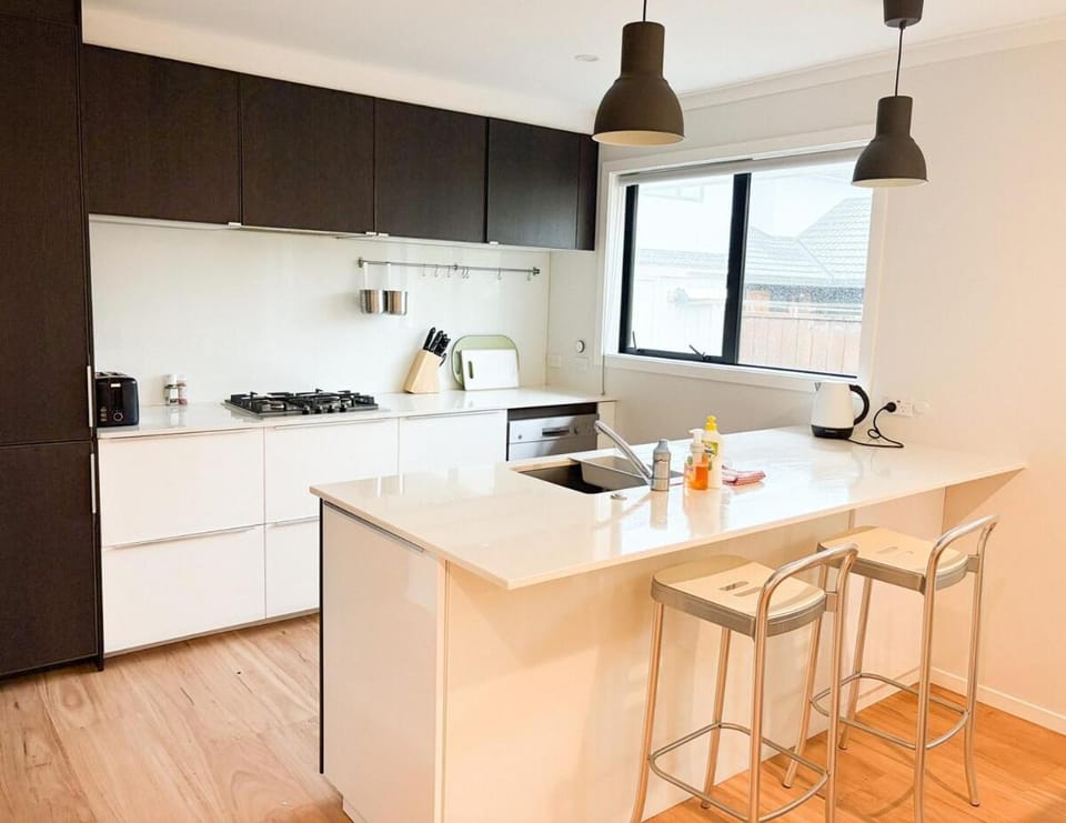 Kitchen or kitchenette, dishwasher, stove, toaster