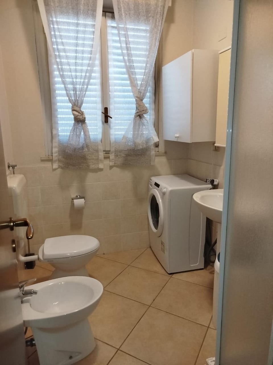 Bathroom, bidet, washing machine