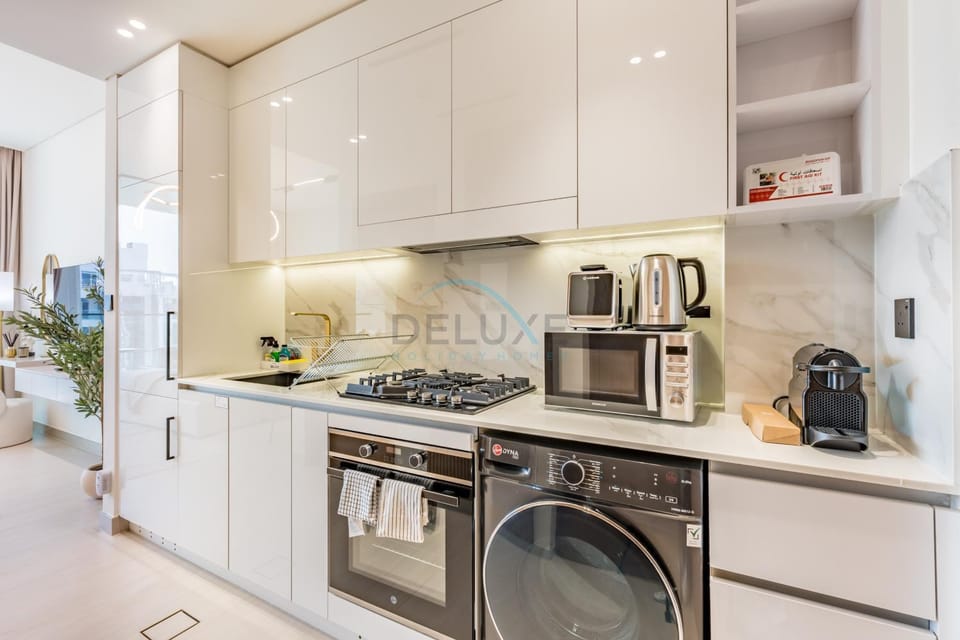 microwave, oven, stove, toaster, washing machine, kitchen