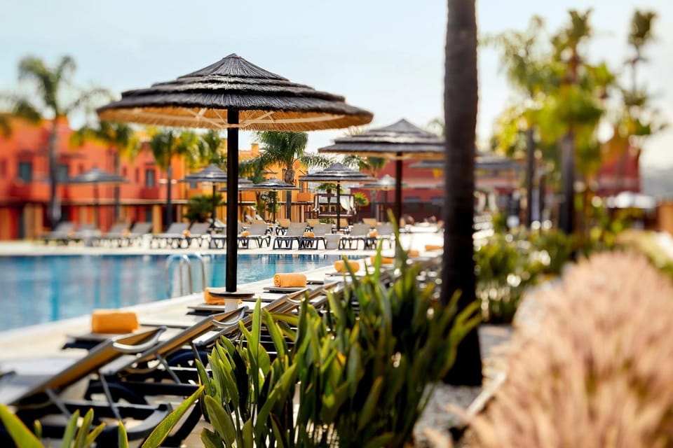 Property building, Pool view, Swimming pool, sunbed