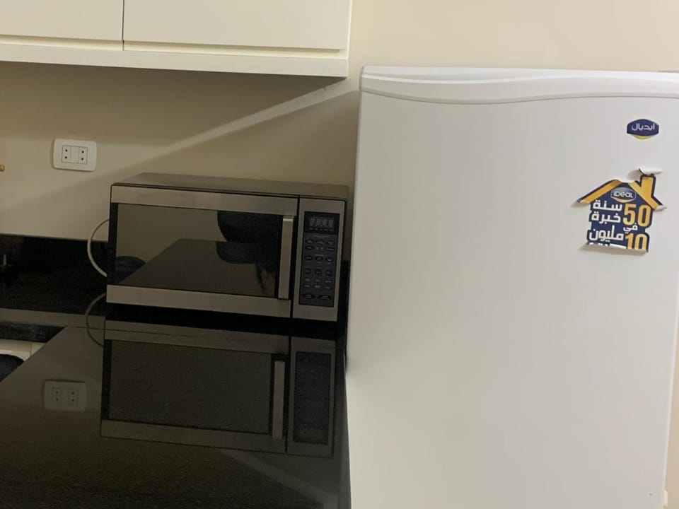 Kitchen or kitchenette, oven