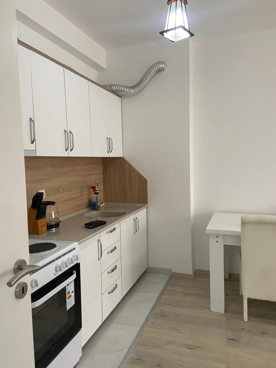 Kitchen or kitchenette, oven, stove