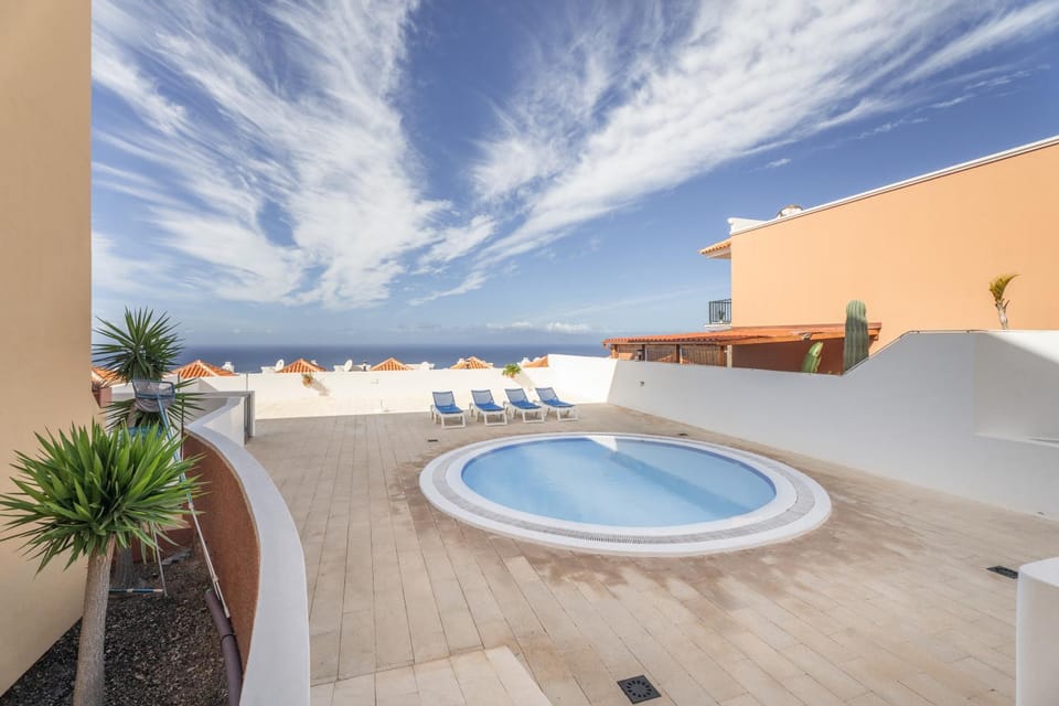 Property building, Living room, Swimming pool