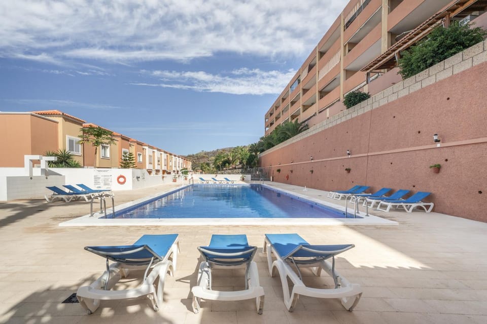 Property building, Living room, Swimming pool