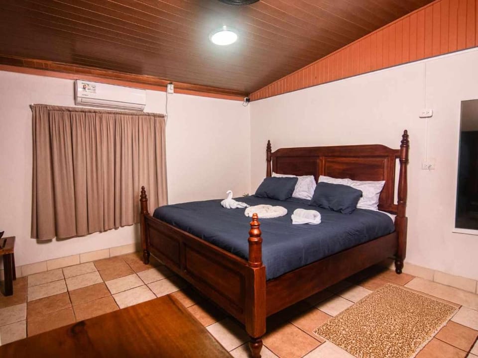 Bed, Photo of the whole room, Bedroom, towels, air conditioner