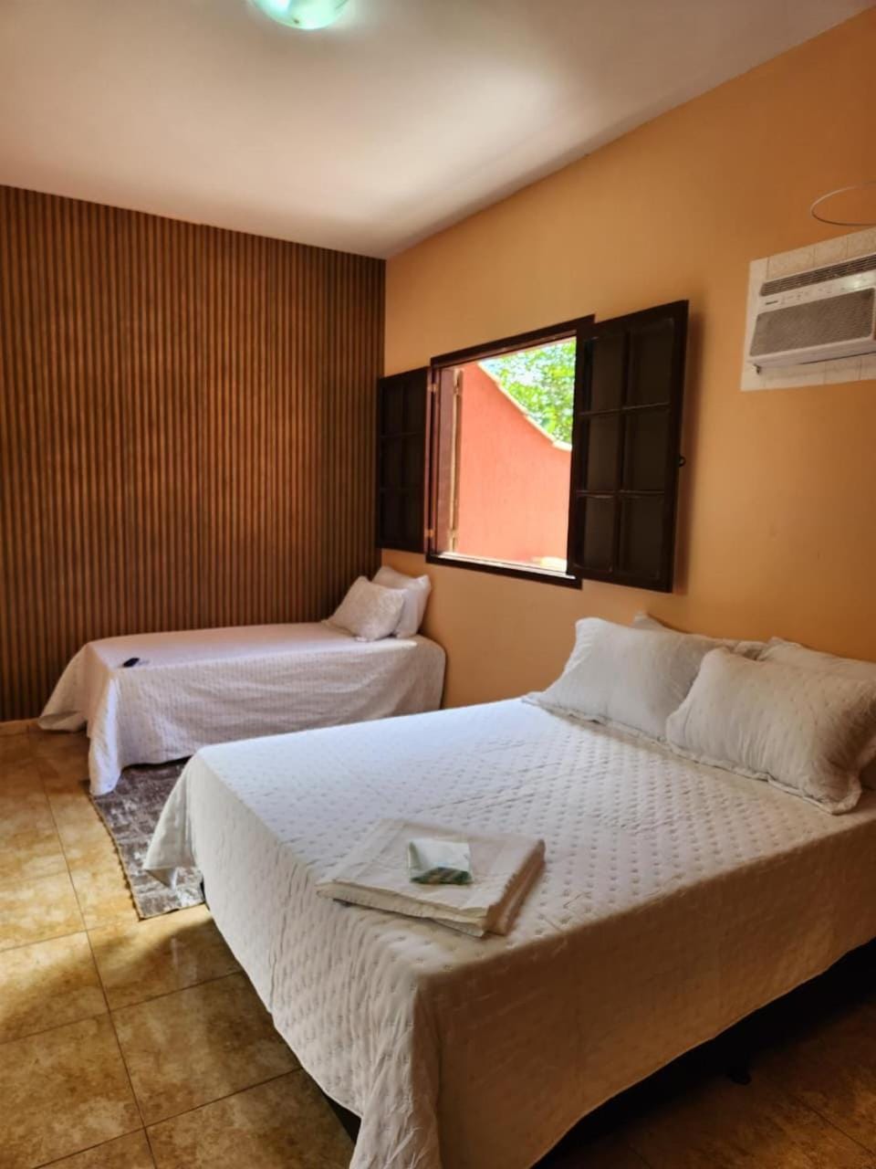 Bed, Photo of the whole room, Bedroom, towels, air conditioner