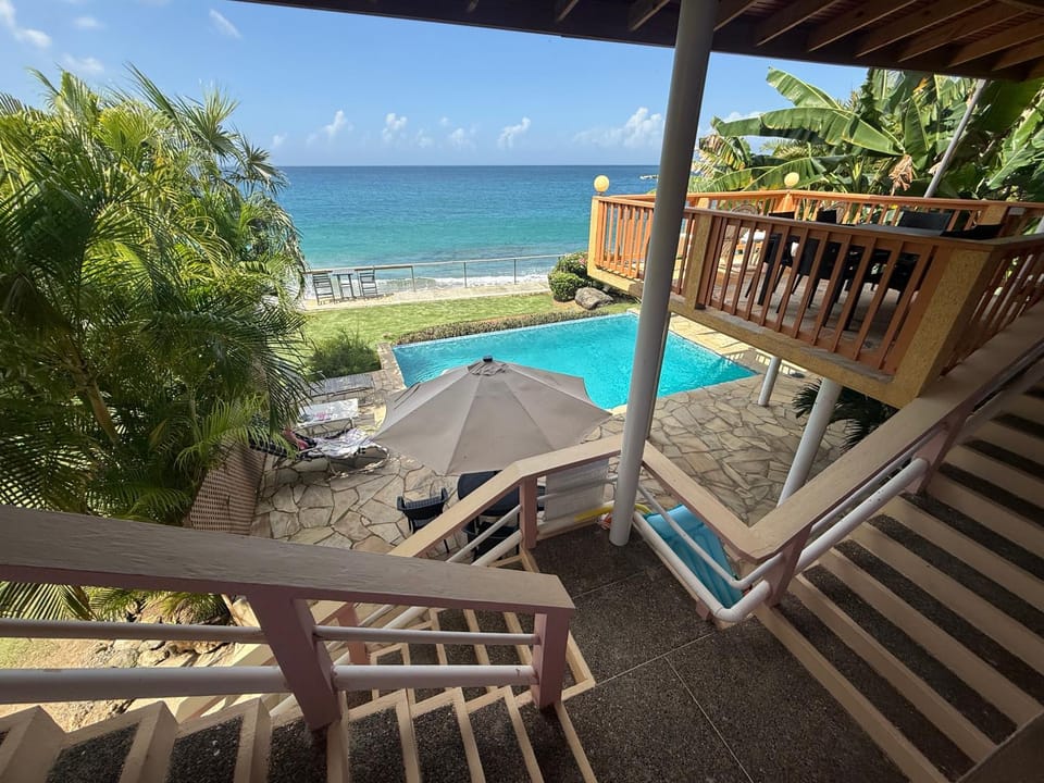 Property building, Patio, View (from property/room), Balcony/Terrace, Beach, Pool view, Sea view, Swimming pool, sunbed