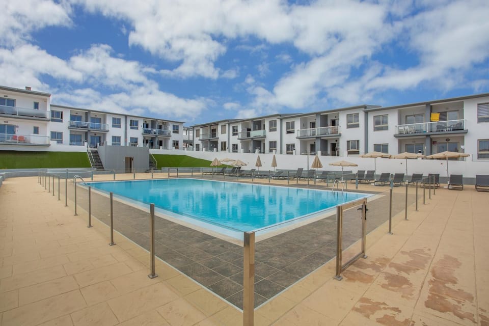 Property building, Living room, Swimming pool