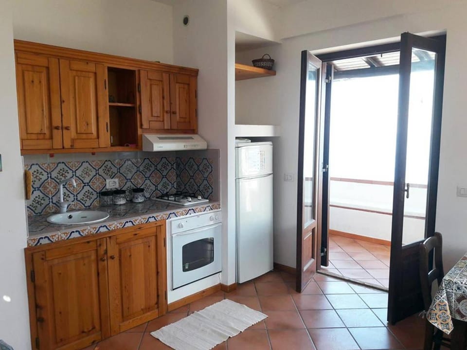 Kitchen or kitchenette, oven, stove