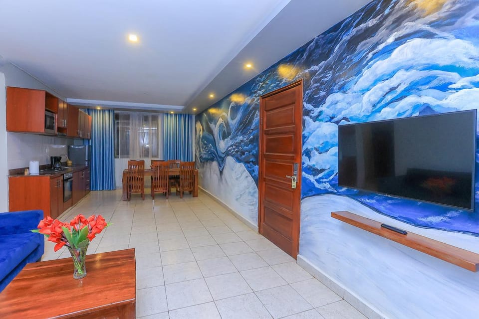 TV and multimedia, Kitchen or kitchenette, Living room, Photo of the whole room, Seating area, Dining area