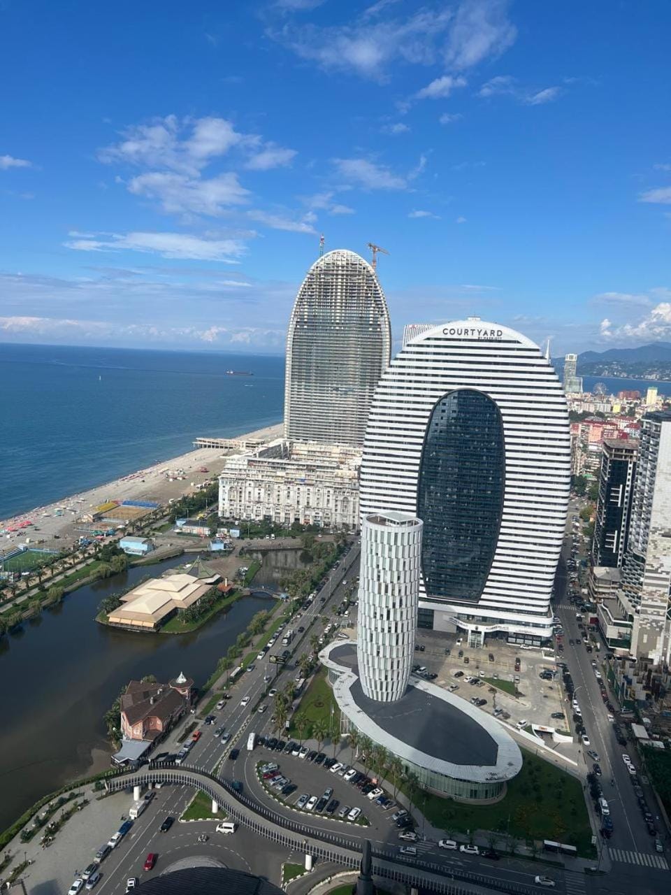 Property building, Day, Neighbourhood, Natural landscape, Bird's eye view, City view, Sea view, Location