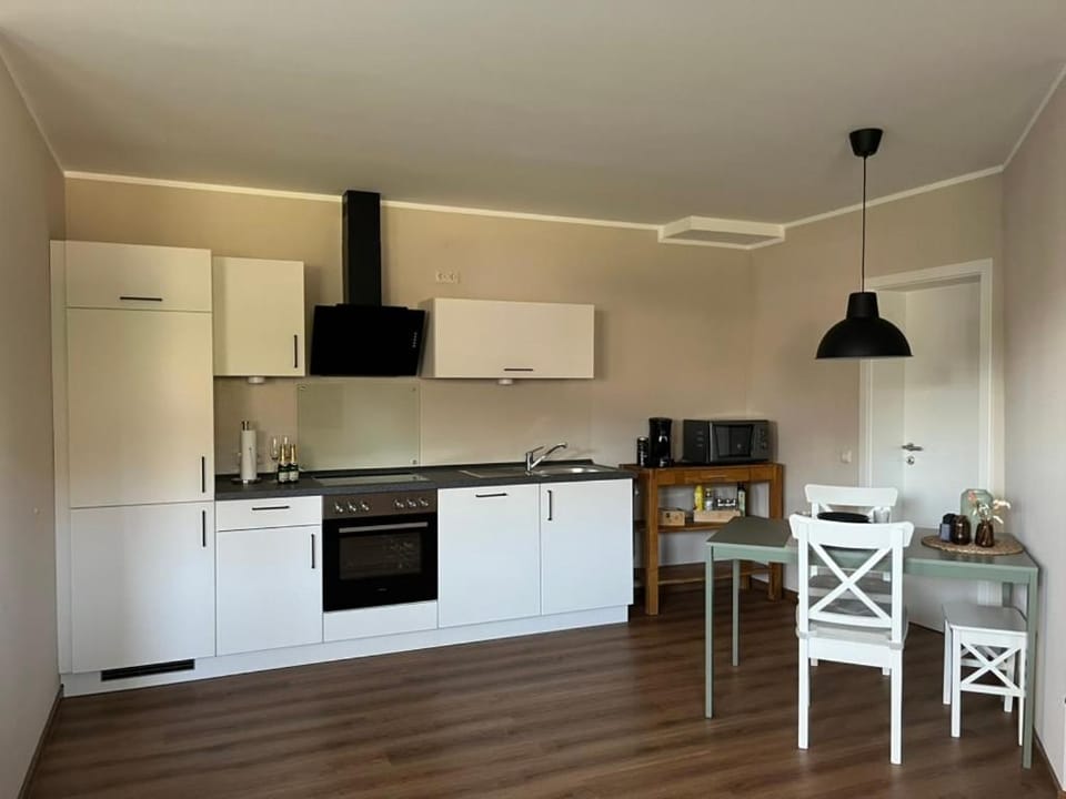 Kitchen or kitchenette, Dining area, dishwasher, oven, stove, toaster