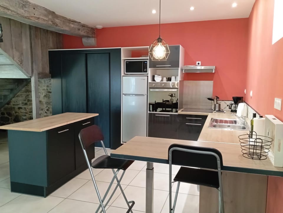 Kitchen or kitchenette, dishwasher, oven, stove, toaster