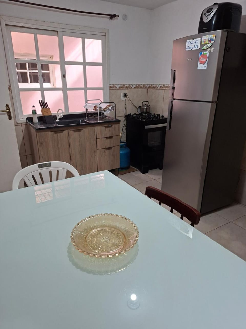Dining area, minibar, oven, stove