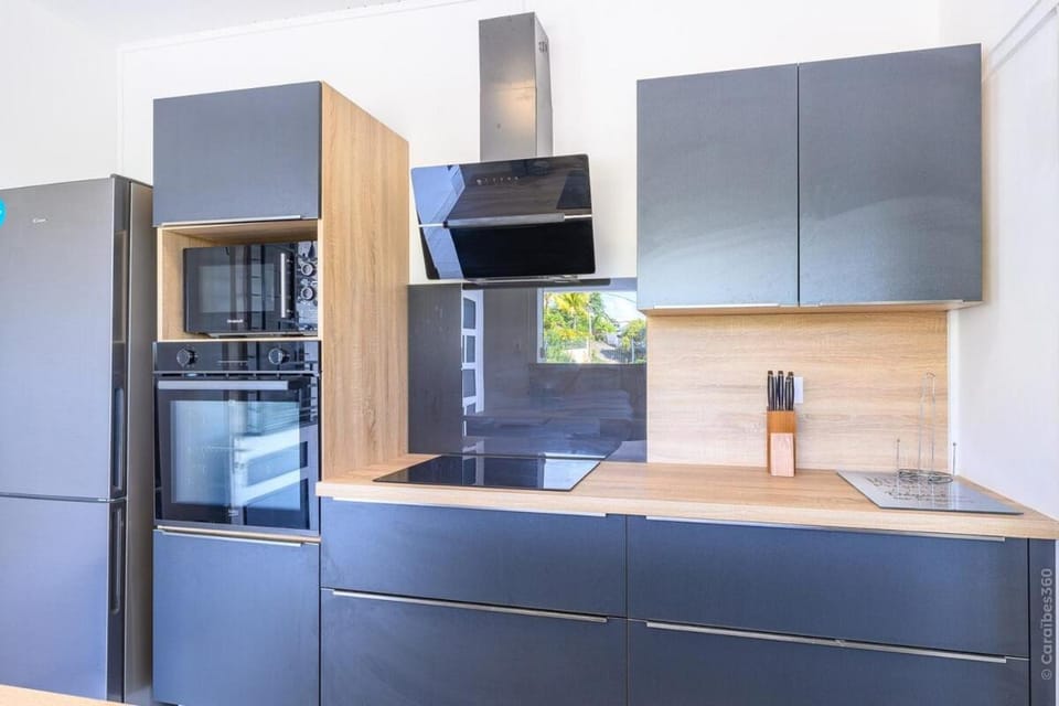 Kitchen or kitchenette, dishwasher, oven, stove