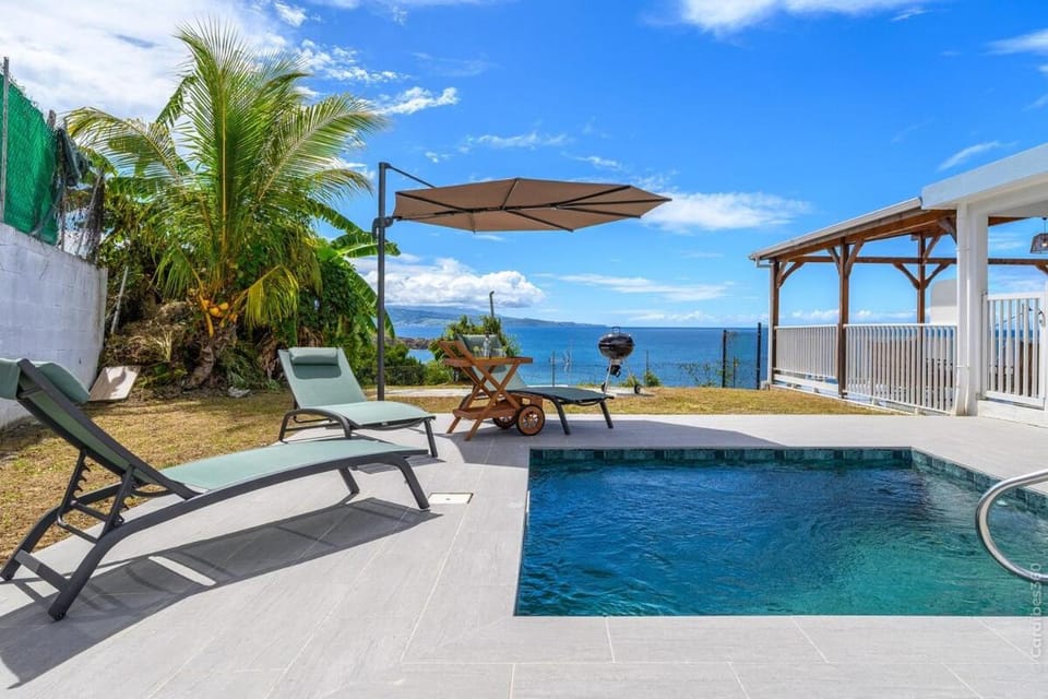 Patio, Day, Natural landscape, Pool view, Sea view, Swimming pool, sunbed
