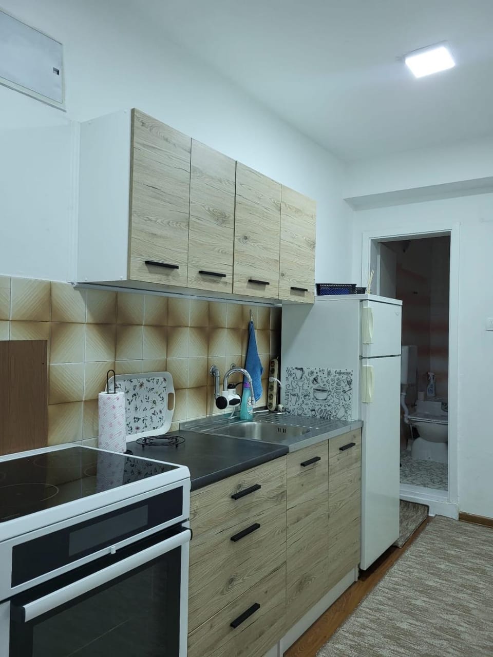 Kitchen or kitchenette, oven, stove