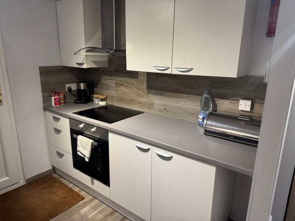 Kitchen or kitchenette, stove