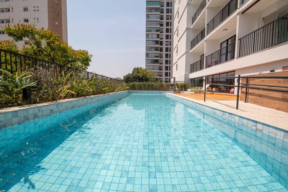 Property building, Day, Pool view, Swimming pool, sunbed
