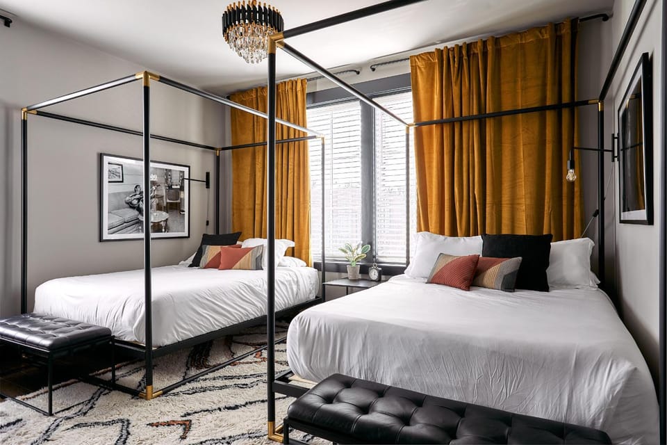 Stylish 2 Suite Penthouse Walk to Shopping, Food, 1 of 7 Themed Lofts at Cowrite, Find Coffee and Tacos Downstairs, Complimentary Spin Class, Walk to Shopping in 12 South, 10 Minutes to Broadway, Parking, 24 Hr Hospitality Apartment in Nashville