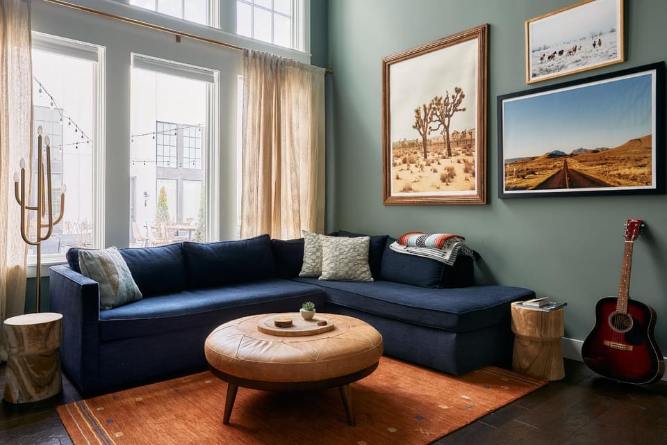 Soaring Ceilings & King Beds Overlooking Courtyard, 1 of 7 Themed Lofts at Cowrite, Find Coffee and Tacos Downstairs, Complimentary Spin Class, Walk to Shopping in 12 South, 10 Minutes to Broadway, Parking, 24 Hr Hospitality Apartment in Nashville