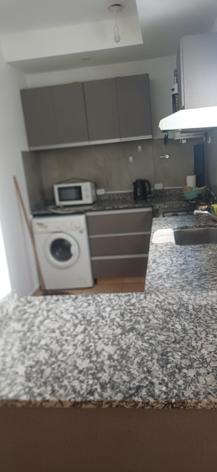 Kitchen or kitchenette, oven, stove