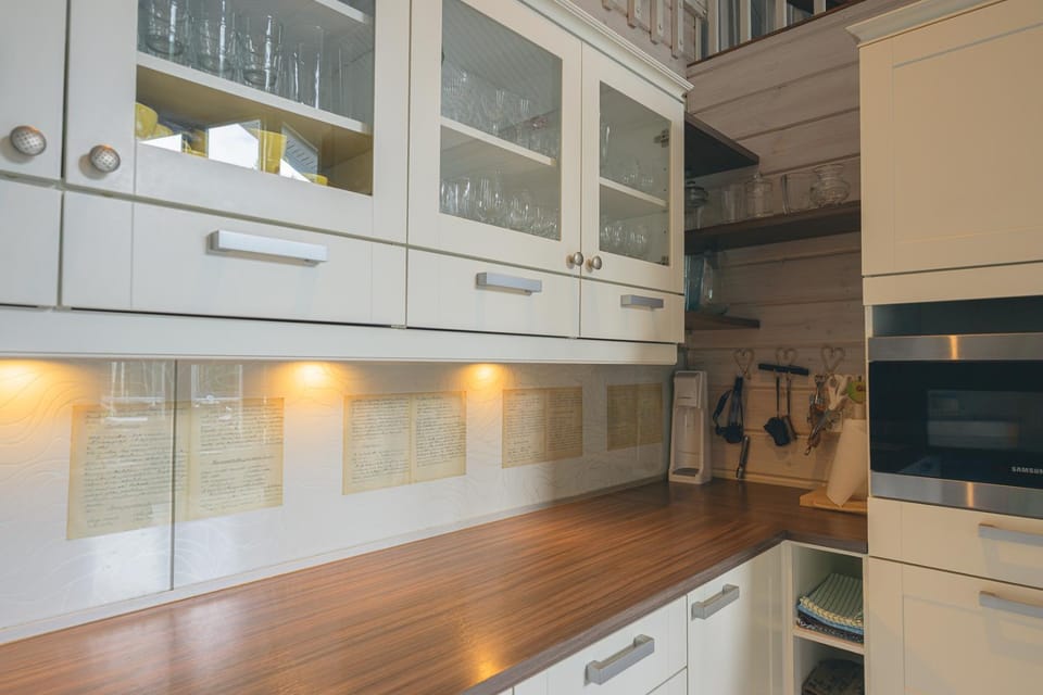 Kitchen or kitchenette, dishwasher, oven, stove
