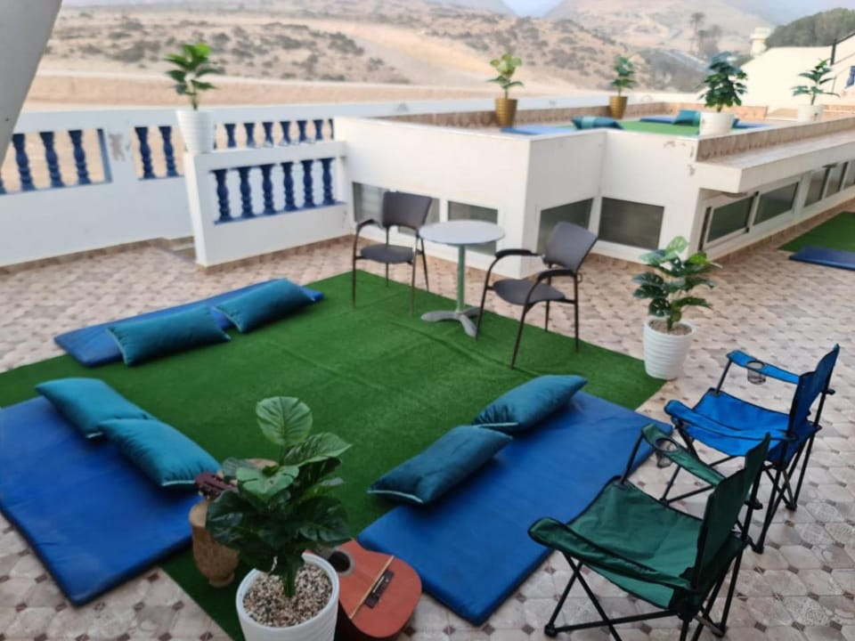 Property building, Patio, Day, Natural landscape, View (from property/room), Balcony/Terrace, Living room, Seating area, Dining area, Mountain view, Inner courtyard view, sunbed