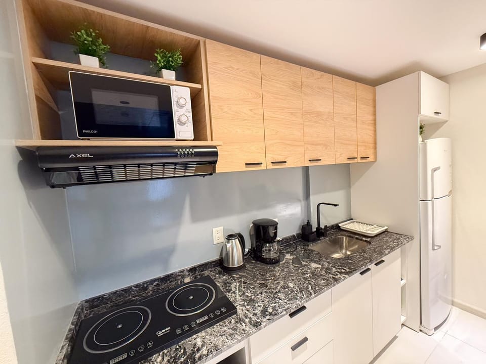 Kitchen or kitchenette, oven, stove, toaster