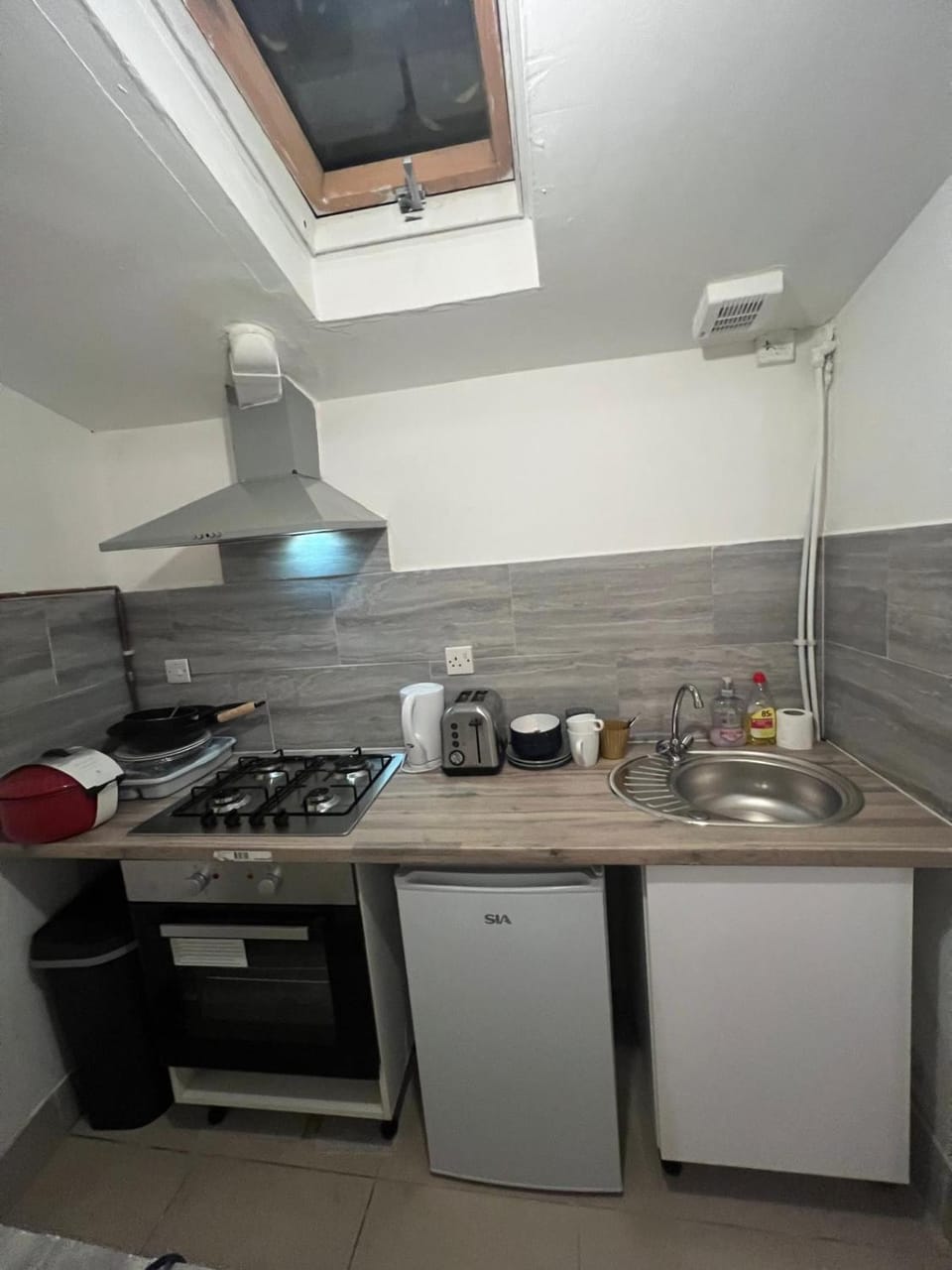 Kitchen or kitchenette, toaster