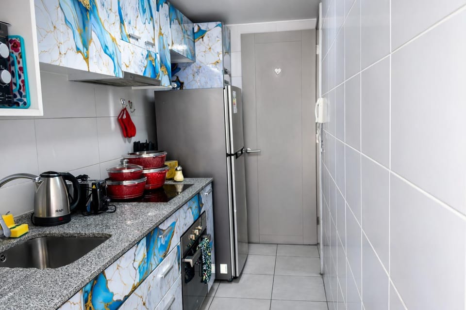 Kitchen or kitchenette, oven, toaster