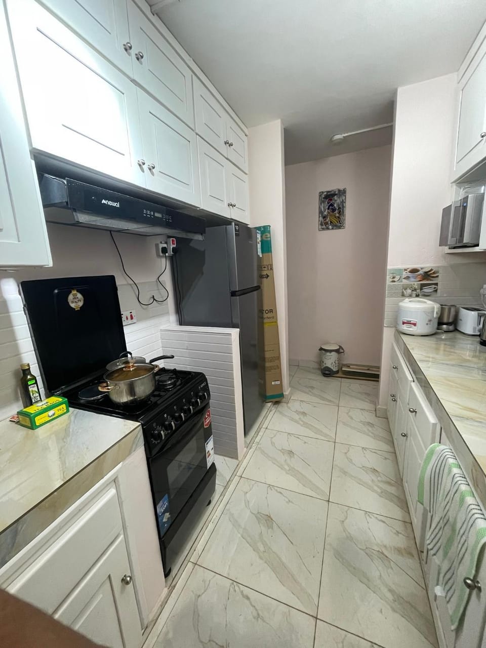 Kitchen or kitchenette, oven, stove, toaster
