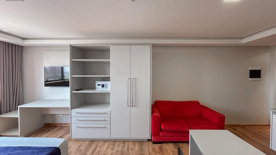 Flat Aconchegante no Centro, com Sofá e Geladeira Apartment in Campo Grande