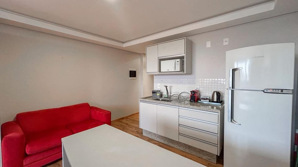 Flat Aconchegante no Centro, com Sofá e Geladeira Apartment in Campo Grande