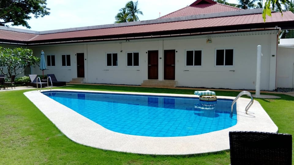 Swimming pool, sunbed